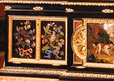 Detail of ebony cabinet, pictures made of inlaid stone